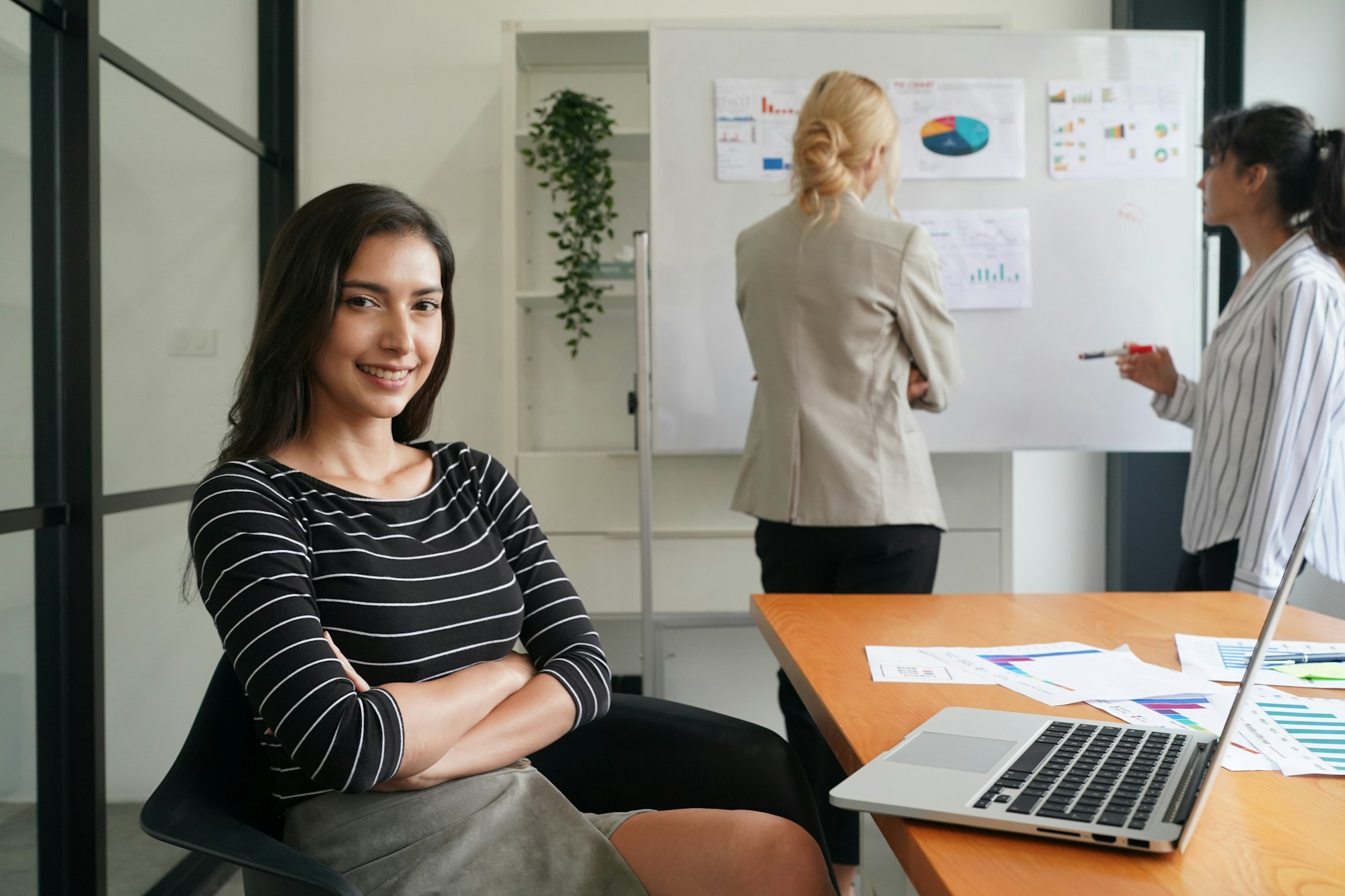 Successful business woman looking confident and smiling